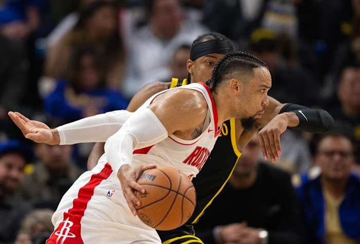Rockets guard Dillon Brooks (9) drives around Golden State Warriors guard Moses Moody (4) during the first quarter at Chase Center.